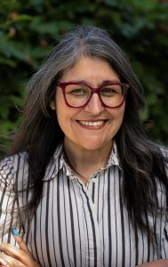 Smiling woman in striped shirt
